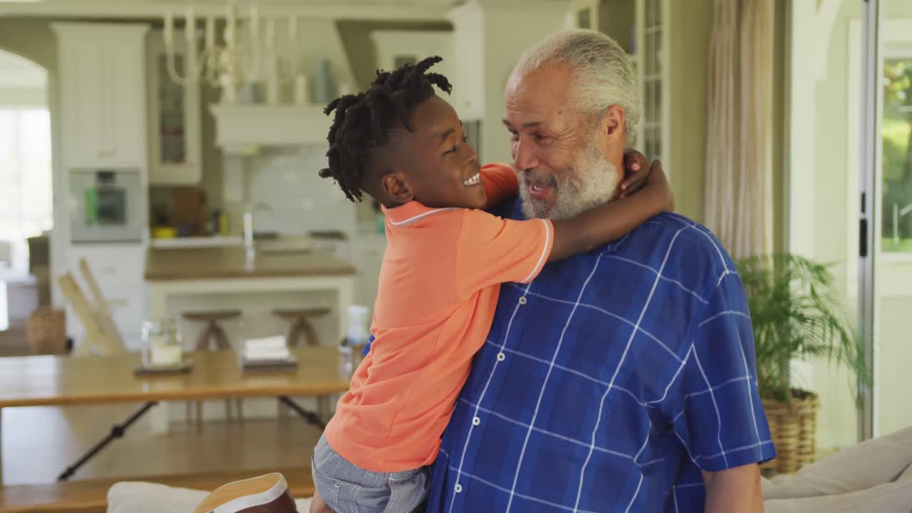 Premium Stock Video Grandfather And Grandson Embracing