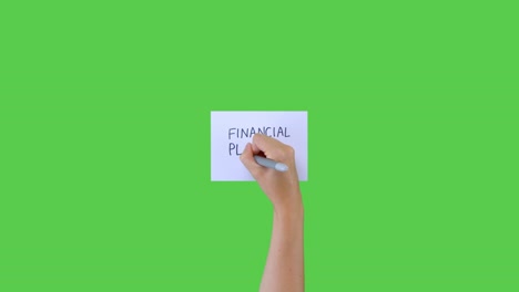 Frau-Schreibt-Finanzplanung-Auf-Papier-Mit-Grünem-Bildschirm