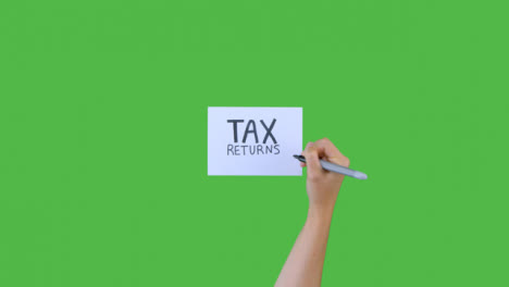 Woman-Writing-Tax-Returns-on-Paper-with-Green-Screen-03