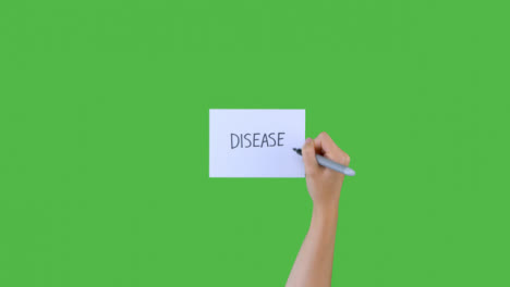 Frau-Schreibt-Krankheit-Auf-Papier-Mit-Grünem-Bildschirm