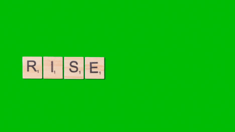 Stop-Motion-Business-Concept-Overhead-Wooden-Letter-Tiles-Forming-Word-Rise-On-Green-Screen-1