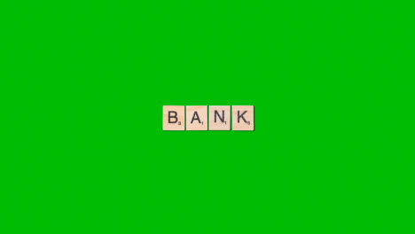 Stop-Motion-Business-Concept-Overhead-Wooden-Letter-Tiles-Forming-Word-Bank-On-Green-Screen