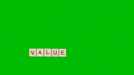 Stop-Motion-Business-Concept-Overhead-Of-Green-Screen-Wooden-Letter-Tiles-Forming-Word-Value