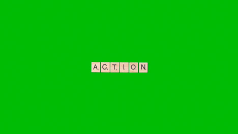 Stop-Motion-Geschäftskonzept-Overhead-Holzbuchstabenfliesen,-Die-Wortaktion-Auf-Grünem-Bildschirm-Bilden