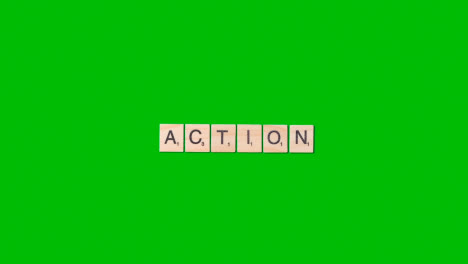 Stop-Motion-Geschäftskonzept-Overhead-Holzbuchstabenfliesen,-Die-Wortaktion-Auf-Grünem-Bildschirm-1-Bilden