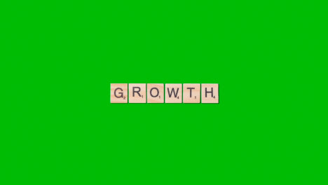 Stop-Motion-Business-Concept-Overhead-Wooden-Letter-Tiles-Forming-Word-Growth-On-Green-Screen-1