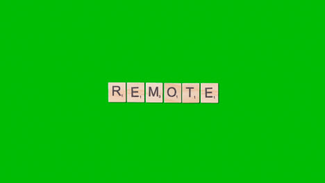 Stop-Motion-Business-Concept-Overhead-Wooden-Letter-Tiles-Forming-Word-Remote-On-Green-Screen-1