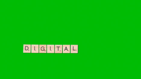 Stop-Motion-Business-Concept-Overhead-Wooden-Letter-Tiles-Forming-Word-Digital-On-Green-Screen-1