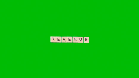 Stop-Motion-Business-Concept-Overhead-Wooden-Letter-Tiles-Forming-Word-Revenue-On-Green-Screen