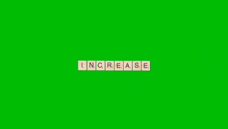 Stop-Motion-Business-Concept-Overhead-Wooden-Letter-Tiles-Forming-Word-Increase-On-Green-Screen