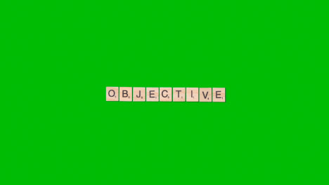 Stop-Motion-Business-Concept-Overhead-Wooden-Letter-Tiles-Forming-Word-Objective-On-Green-Screen