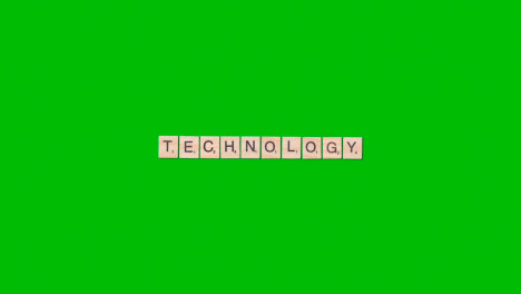 Stop-Motion-Business-Concept-Overhead-Wooden-Letter-Tiles-Forming-Word-Technology-On-Green-Screen