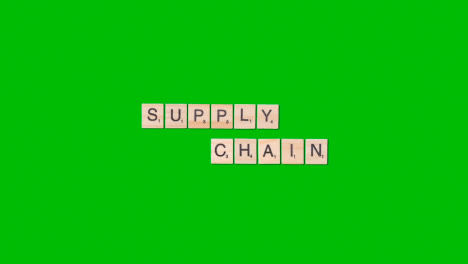 Stop-Motion-Business-Concept-Overhead-Wooden-Letter-Tiles-Forming-Words-Supply-Chain-On-Green-Screen