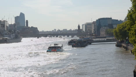 View-From-Tower-Bridge-Towards-City-Skyline-Of-River-Thames-With-HMS-Belfast-And-Tourist-Boats