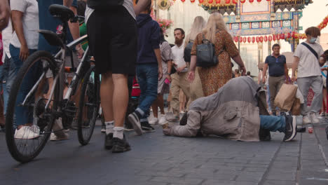 Man-Begging-On-Street-In-Chinatown-London-England-UK