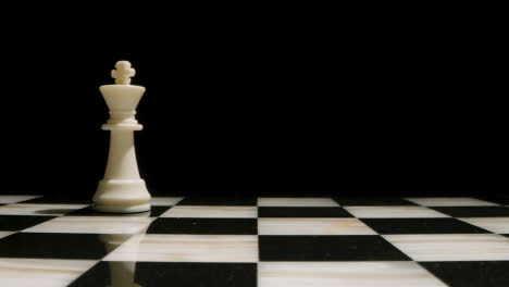 Studio-Shot-Of-Chess-Board-Empty-Apart-From-White-King-Piece-1