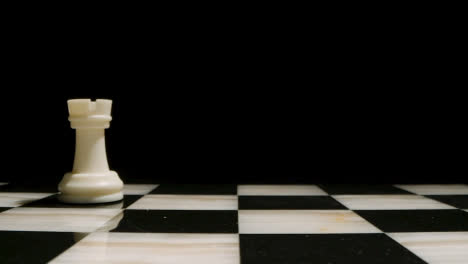 Studio-Shot-Of-Chess-Board-Empty-Apart-From-White-Rook-Piece-1