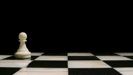 Studio-Shot-Of-Chess-Board-Empty-Apart-From-White-Pawn-Piece