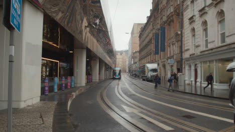 Tram-Lines-In-Front-Of-The-Grand-Central-Shopping-Centre-In-Birmingham-UK-On-Rainy-Day-1