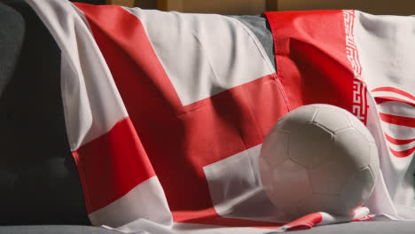 Sofa-In-Lounge-With-English-And-American-Flags-And-Ball-As-Fans-Prepare-To-Watch-Football-Soccer-Match-On-TV-1