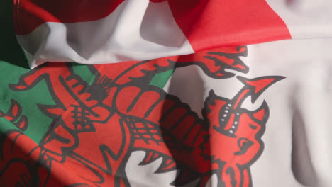 Studio-Still-Life-Shot-Of-English-And-Welsh-Flags-From-Soccer-World-Cup-Group-Stage-Teams-2022