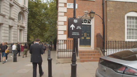 Tracking-Shot-Approaching-Black-Taxi-Cab-In-London