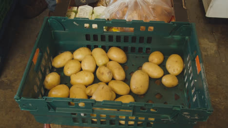 Interior-Of-UK-Food-Bank-Building-With-Fresh-Food-Being-Sorted-For-Delivery-6