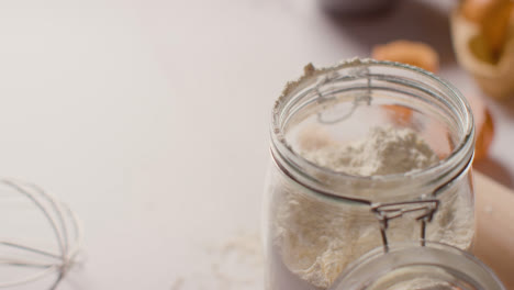 Close-Up-Of-Messy-Kitchen-Surface-With-Ingredients-And-Utensils