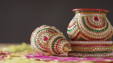 Traditional-Coconut-Pots-On-Table-Decorated-For-Celebrating-Festival-Of-Diwali-2