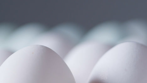 Close-Up-Studio-Shot-Of-White-Eggs-In-Cardboard-Tray-1