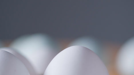 Close-Up-Studio-Shot-Of-White-Eggs-In-Cardboard-Tray-2