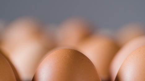 Close-Up-Studio-Shot-Of-Brown-Eggs-In-Cardboard-Tray-2