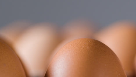 Close-Up-Studio-Shot-Of-Brown-Eggs-In-Cardboard-Tray-3