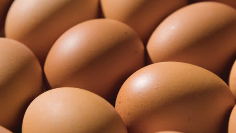 Close-Up-Studio-Shot-Of-Brown-Eggs-In-Cardboard-Tray-6