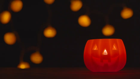 Halloween-Pumpkin-Jack-O-Lantern-With-Candle-Made-From-Carved-Out-Pumpkin-With-Lights