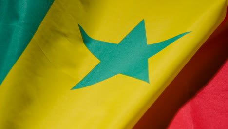 Close-Up-Studio-Shot-Of-Senegalese-Flag-Filling-Frame