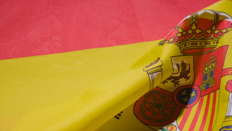 Close-Up-Studio-Shot-Of-Spanish-Flag-Filling-Frame