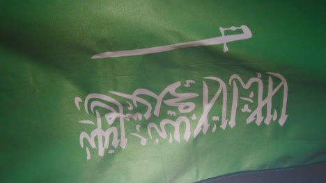 Close-Up-Studio-Shot-Of-Saudi-Arabian-Flag-Flying-Filling-Frame