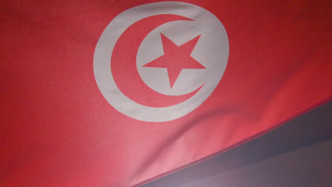 Close-Up-Studio-Shot-Of-Tunisian-Flag-Flying-Filling-Frame