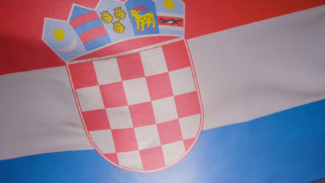 Close-Up-Studio-Shot-Of-Croatian-Flag-Flying-Filling-Frame