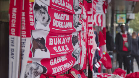 Stall-Selling-Club-Merchandise-Outside-The-Emirates-Stadium-Home-Ground-Arsenal-Football-Club-London-With-Supporters-On-Match-Day-2