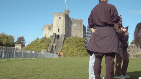 Tourists-Taking-Photos-In-Front-Of-Cardiff-Castle-In-Wales