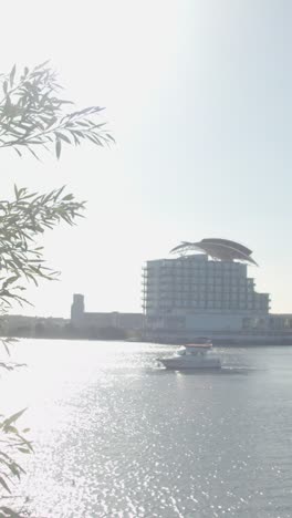 Vertical-Video-Across-Cardiff-Bay-To-Pierhead-Building-In-Wales