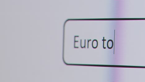 Primer-Plano-De-La-Pantalla-Con-Una-Persona-Escribiendo-Euro-A-Libra-Esterlina-En-El-Motor-De-Búsqueda-De-La-Computadora