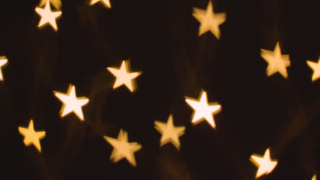 Hintergrund-Der-Weihnachtsbeleuchtung-In-Form-Von-Sternen-2
