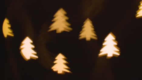 Hintergrund-Der-Weihnachtsbeleuchtung-In-Form-Von-Weihnachtsbäumen-1