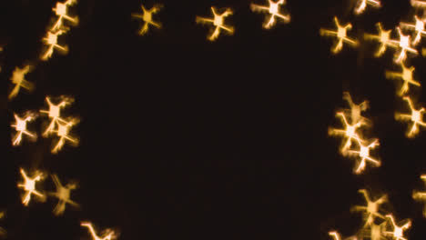 Background-Of-Christmas-Lights-In-The-Shape-Of-Snowflakes-With-Copy-Space