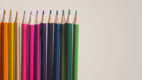 Studio-Shot-Of-Multi-Coloured-Pencils-Against-White-Background-2