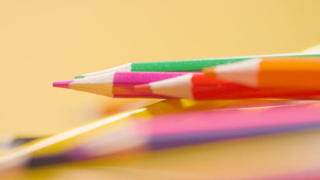 Close-Up-Shot-Of-Randomly-Arranged-Rotating-Multi-Coloured-Pencils-7