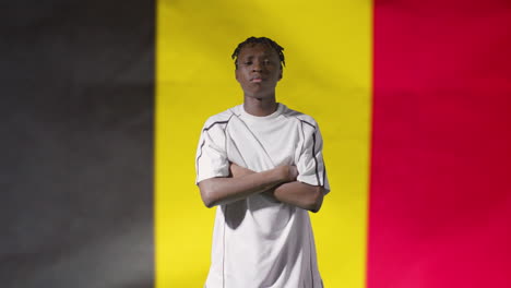 Young-Footballer-Posing-In-Front-of-Belgium-Flag-02